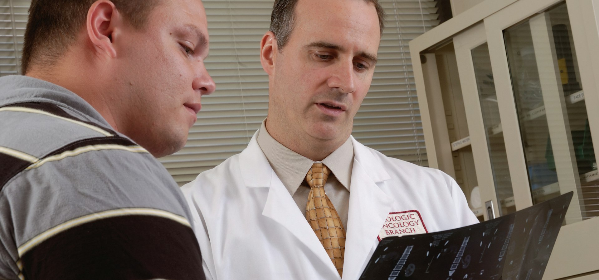 Doctor reviewing colonoscopy results with a patient